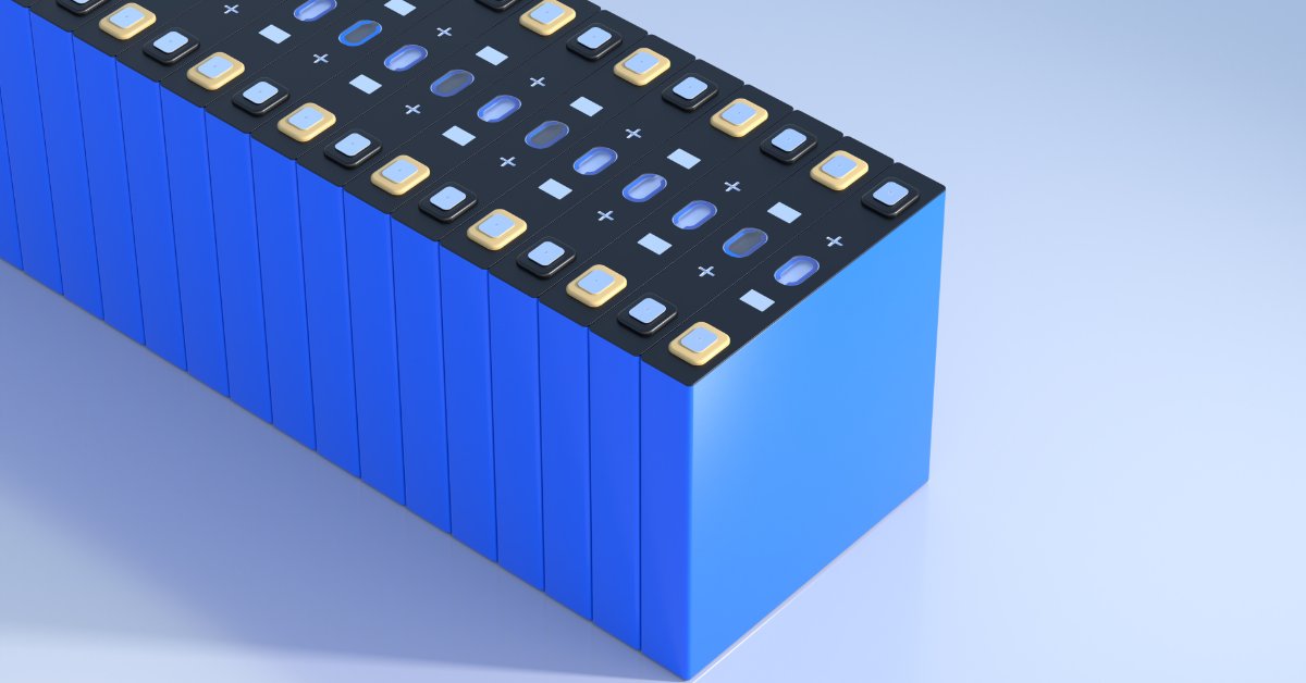 A long stack of bright blue lithium-ion phosphate batteries with black and yellow terminals and a smooth, clean exterior.